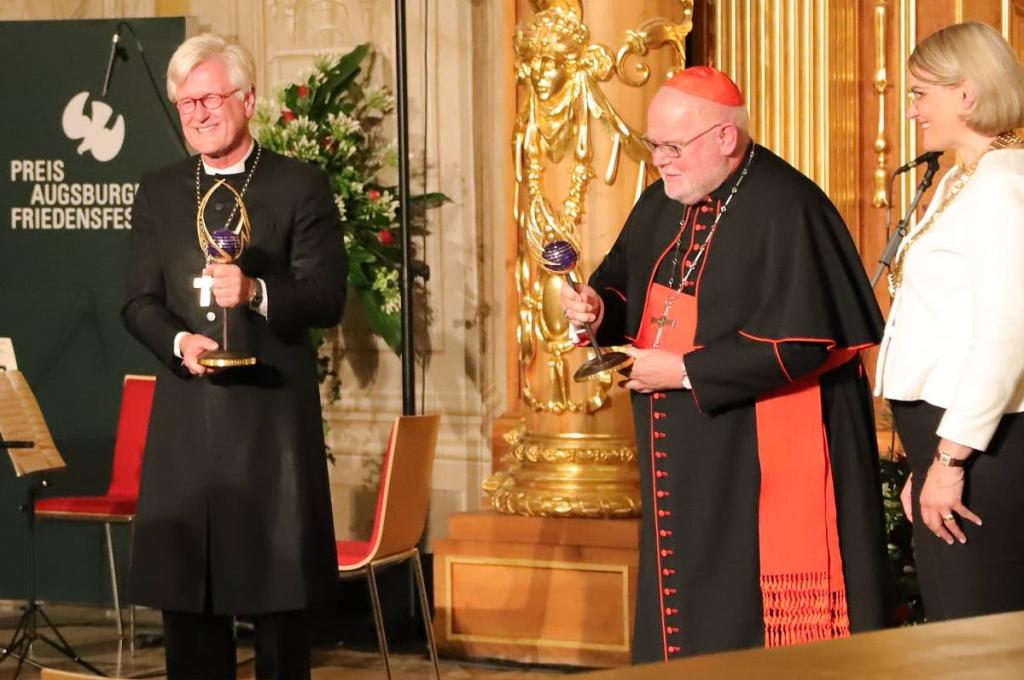 Sant'Egidio gratuliert Kardinal Marx und Landesbischof Bedford-Strohm zum Augsburger Friedenspreis und dankt für Zuwendung des Preisgeldes für die Ärmsten